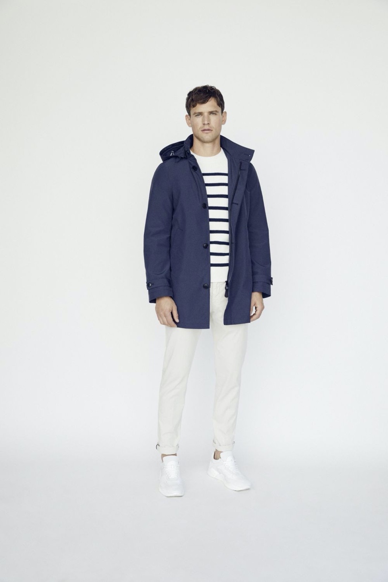 Marc O'Polo highlights classic nautical style with its white Breton striped sweater and a navy parka. 